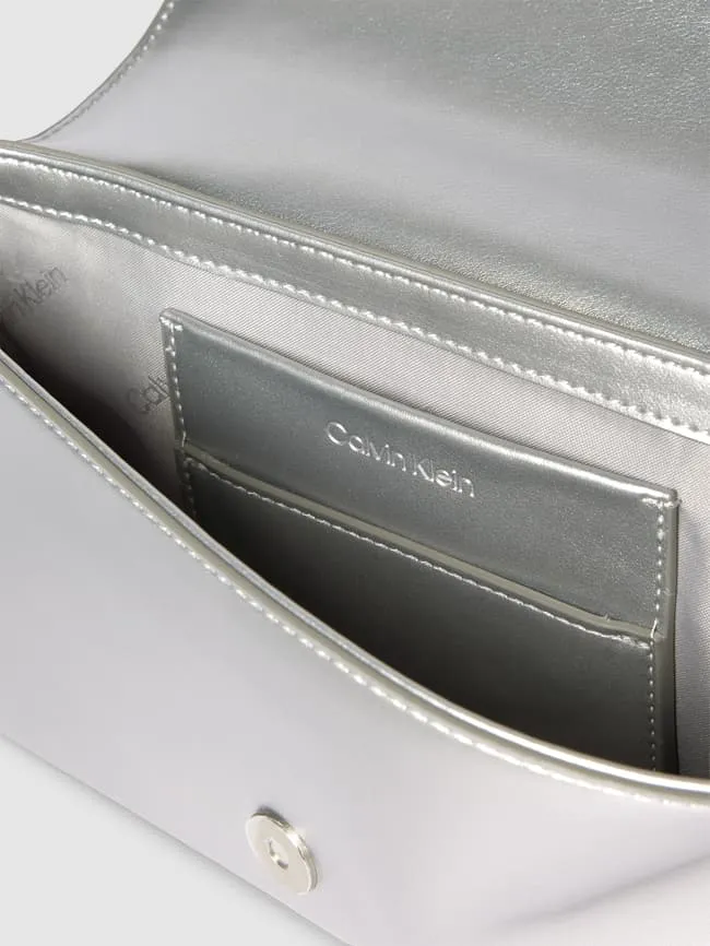 Handbag with label appliqué, model CK MUST Calvin Klein, silver