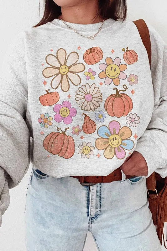 SMILEY PUMPKIN DAISY GRAPHIC SWEATSHIRT