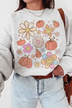 SMILEY PUMPKIN DAISY GRAPHIC SWEATSHIRT